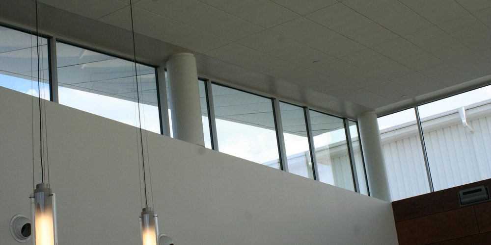 View of upper part of Hawker Beechcraft lobby, showing line of large exterior windows